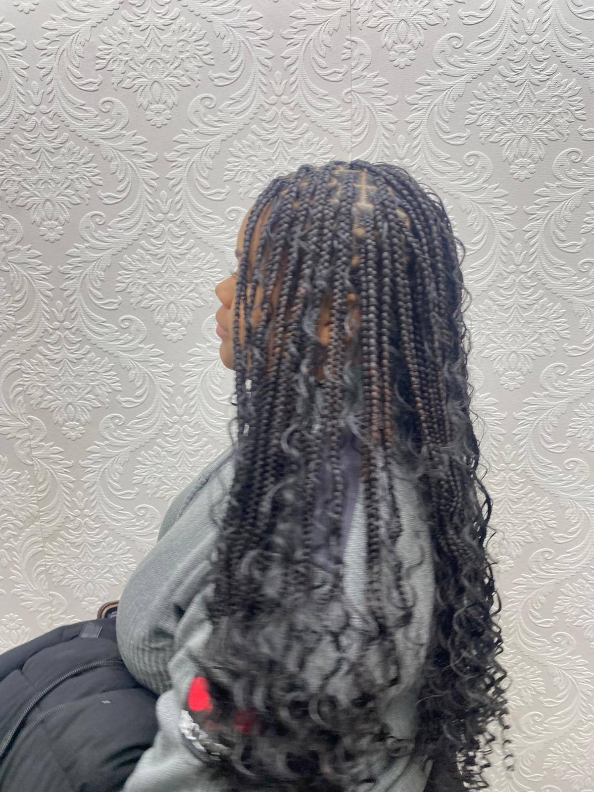 Boho braids with curl accents, side view