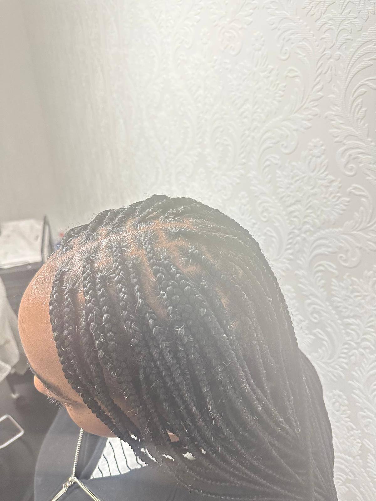 Knotless braids part way through installation